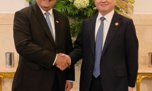 中国人民银行与印度尼西亚银行签署《关于建立促进双边交易本币结算合作框架的谅解备忘录》